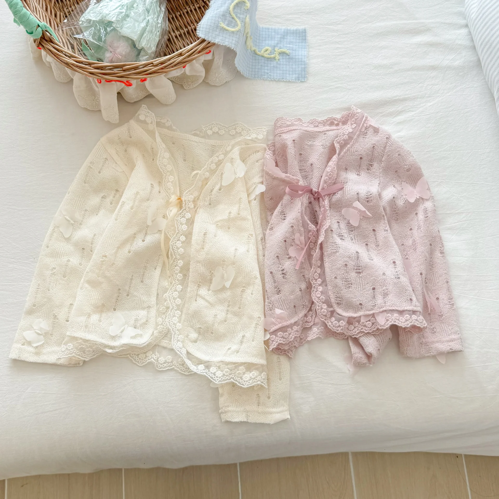 سترة صوفية محبوكة ناعمة بفيونكة جديدة للفتيات الصغيرات ملابس واقية من الشمس رقيقة للفتيات قمصان مفرغة لتكييف الهواء #2