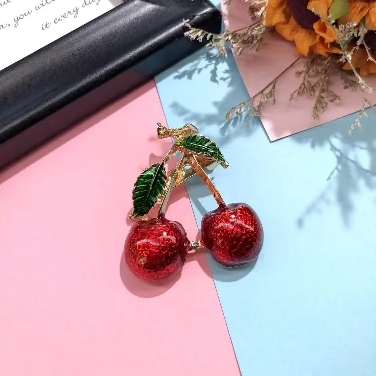 Brand new female Japanese and Korean design ins cherry brooch niche versatile sweater suit accessories factory direct wholesale