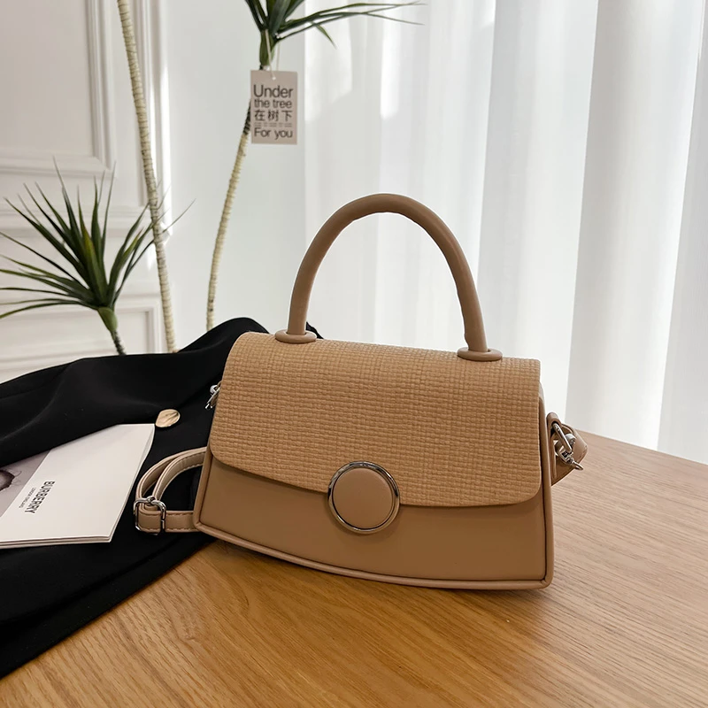 

Minimalist Luxury Leather Diaper Bag: Elegant Crossbody Handbag For Women With Designer Letter Logo And Large Tote Capacity