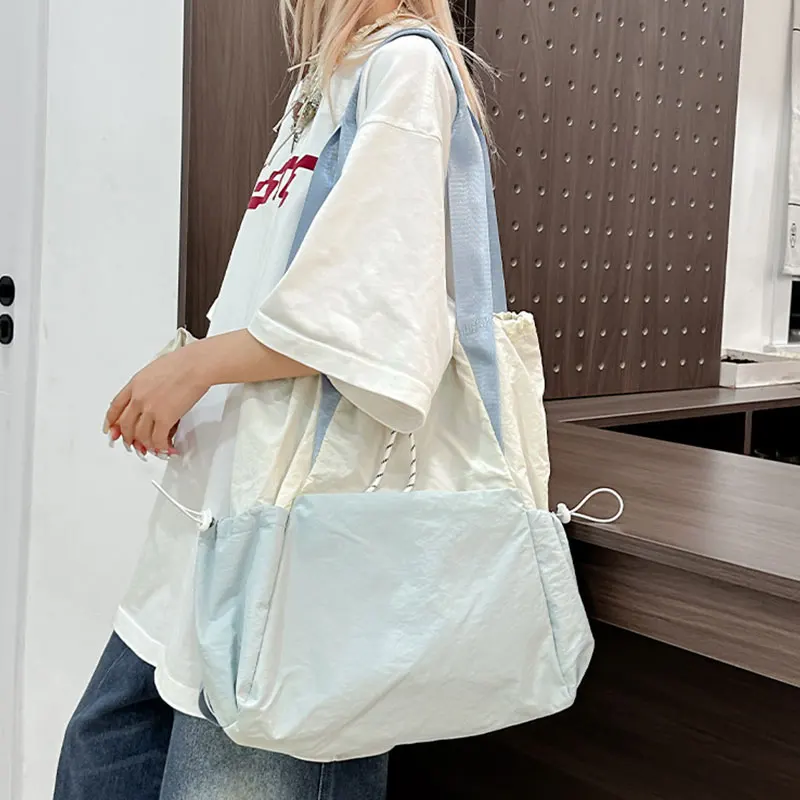 

Niche Design Light Nylon Backpack Shoulder Bag for Women New 2025 Fashion Commuter Tote Bag Daily Student Drawstring Backpacks