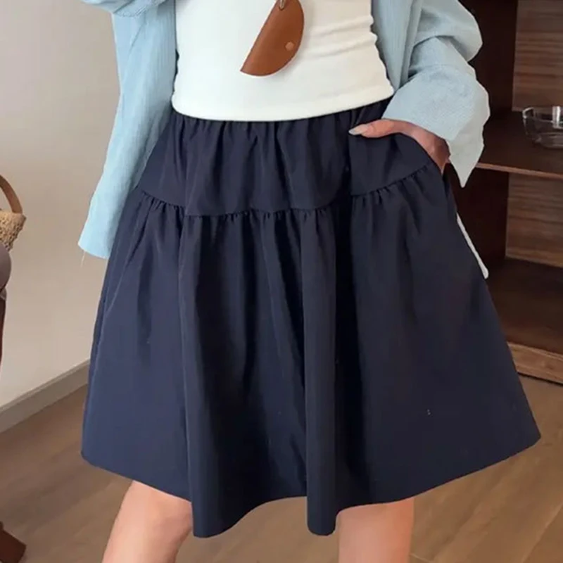 College Style Loose A Line Skirts Women 2026 Summer Elastic High Waist Pleated Skirts Woman Japanese Solid Knee-Length Skirt