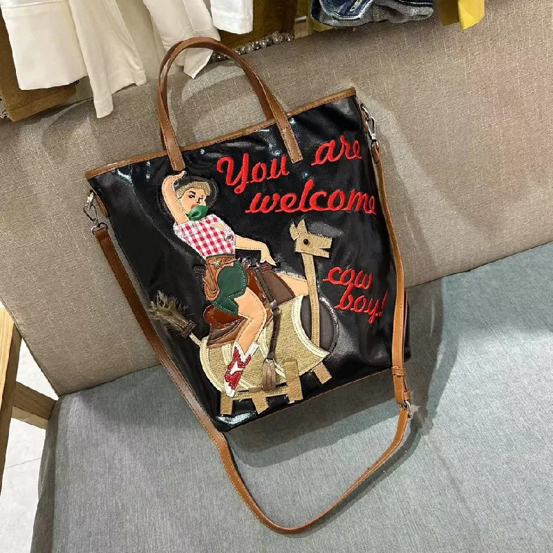 2024 new spliced embroidered cartoon handbag large capacity canvas bucket bag versatile crossbody hand bag ladies  luxury bag