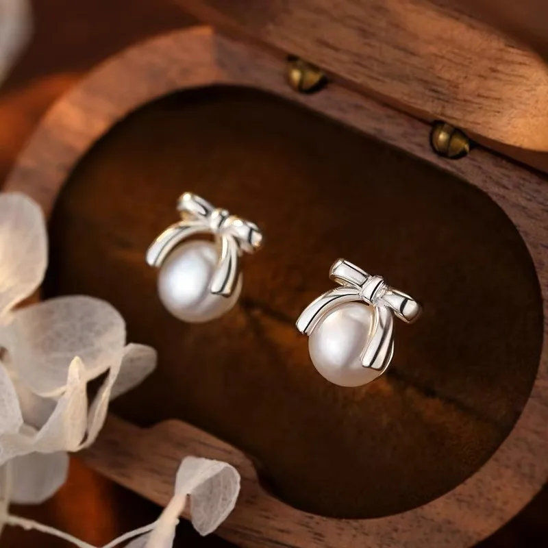 

Real 925 Sterling Silver Bowknot Pearl Mini Stud Earrings For Women Party Classic Fine Jewelry Small Niche Accessories