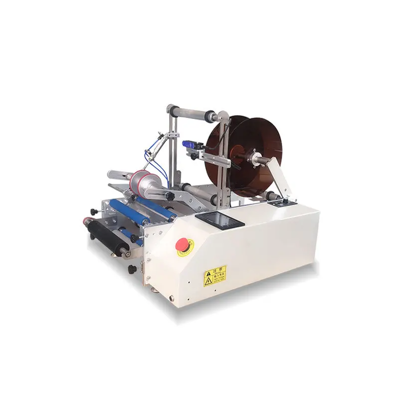 

Semi-automatic round bottle labeling hine, glass water Baijiu food labeling hine, small garden bottle labeling hine