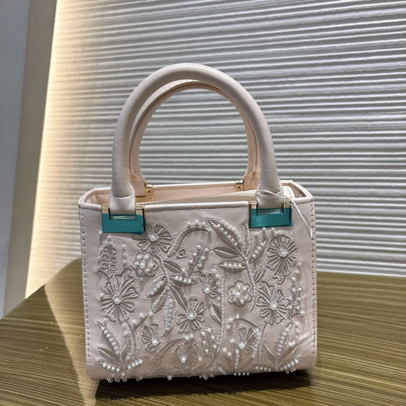 

Women's versatile new handbag with artificial pearl embellishments and chain handle, silk satin texture, hard texture bag