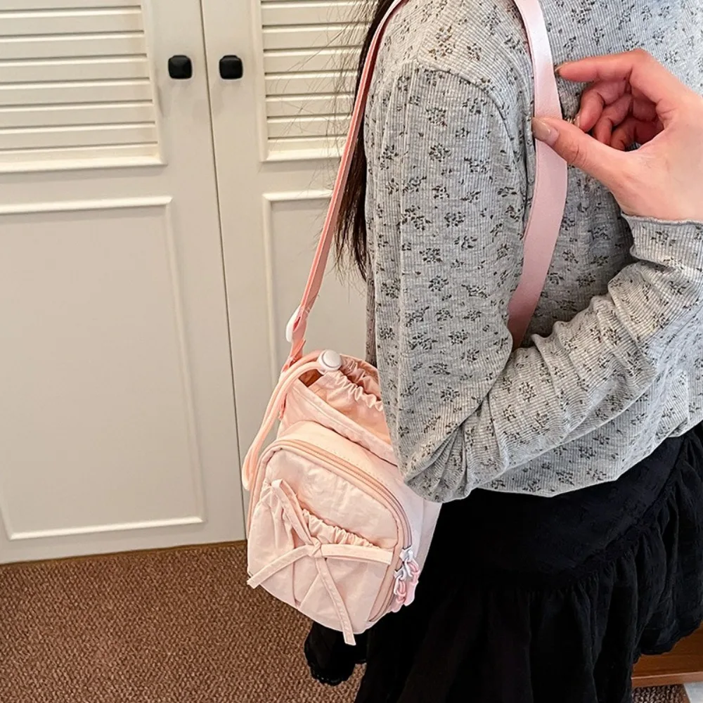 

Portable Bow Water Bottle Bag Drawstring Nylon Phone Crossbody Bag Solid Color Korean Style Water Cup Bag Outdoor