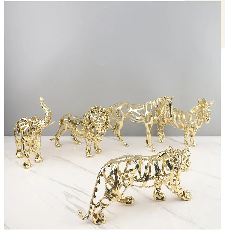 

European style light luxury gold hollowed out lion horse elephant animal sculpture living room metal decoration home accessories