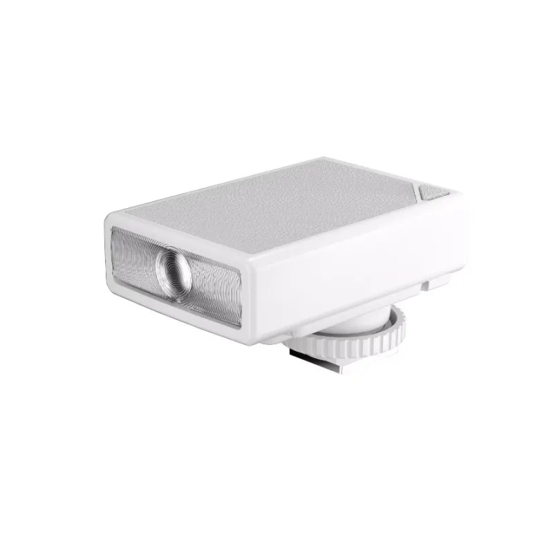 The camera is equipped with a mini over-camera flash photography shoe and a fill light overhead light stand