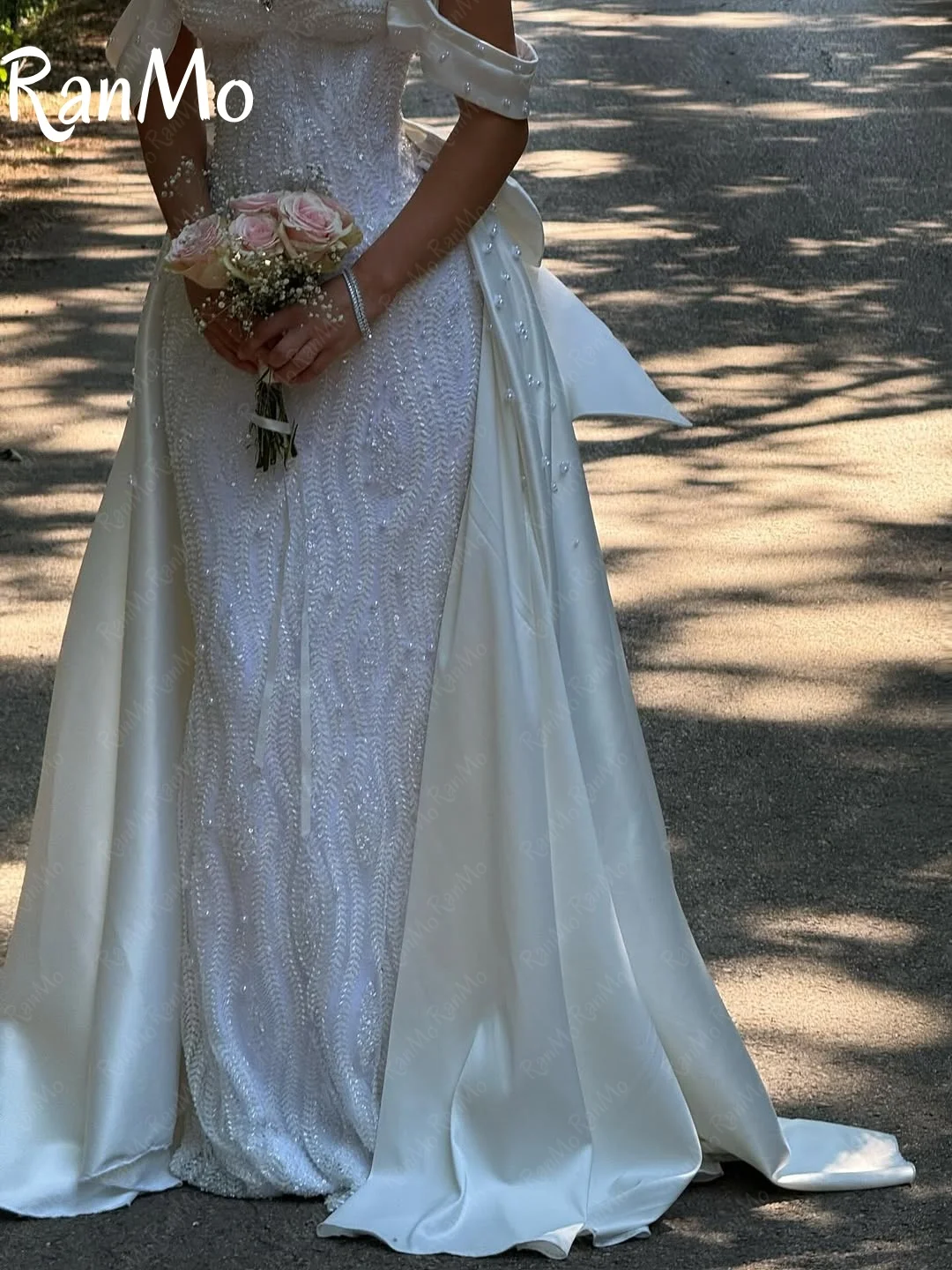 Ranmo جديد 2025 فستان زفاف فاخر على شكل قلب بدون أكتاف مطرز بفيونكة دانتيل Vestido de novia فستان زفاف لؤلؤي مشد مخصص