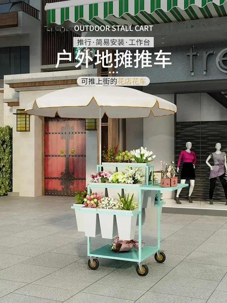 A Street vendors selling flower carts, night markets, outdoor flower shop supplies, flower bouquets, folded multiple layers