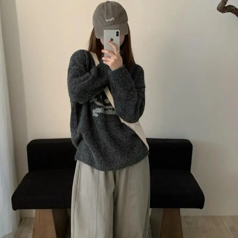 ホット秋冬新女性ファッションカジュアルセーターファッション漫画ハローキティジャカードラウンドネックルーズ多用途ニットセーター