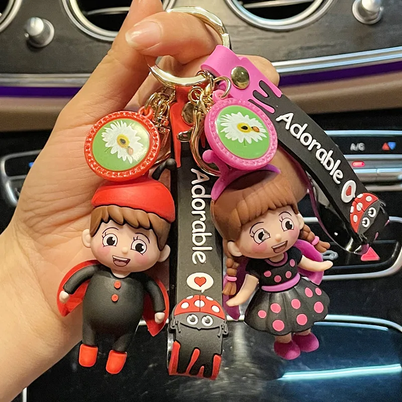 

miniso Cartoon boy and girl keychain pendants, fashionable couple bags, key chain ornaments