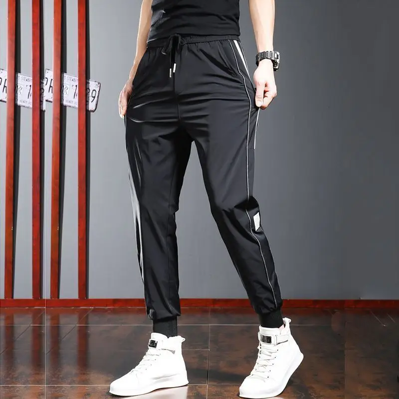 

Trendy Ice Silk Men's 2024 Summer Thin Quick Drying Trendy Handsome Versatile Striped Sports Casual Nine Part Bundle Leg Pants