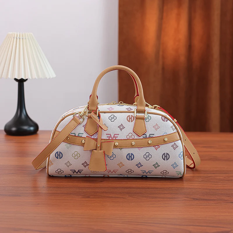 Women's Boston Handbag with Colorful Lettering and Monogram Print, Cylindrical Boston Bag with Front Rivet Trim and Bow Pendant, Zippered Interior, Two Carrying Methods: Handheld and with Detachable Adjustable Long Shoulder Strap, Fresh Retro Style, Versatile for Daily Use, Shopping, Dating, Short Trips, and Storage, Can Be Used as a Crossbody or Handbag for Women