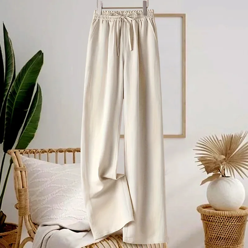 بنطلون صيفي جديد فضفاض وواسع الساق بلون سادة من القطن والكتان مع خصر مطاطي ورباط للسيدات