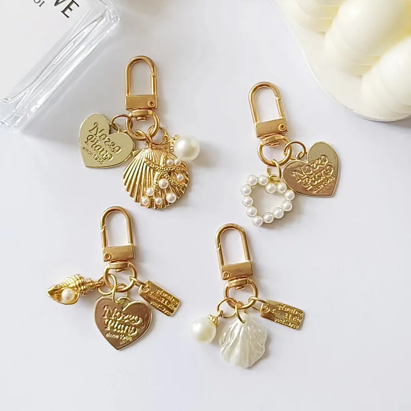 Creative Alloy Shell Pearl Key Chain for Women Cute Conch Pendant Keyring Handbag Ornament Car Key Accessories Small Gifts view 2