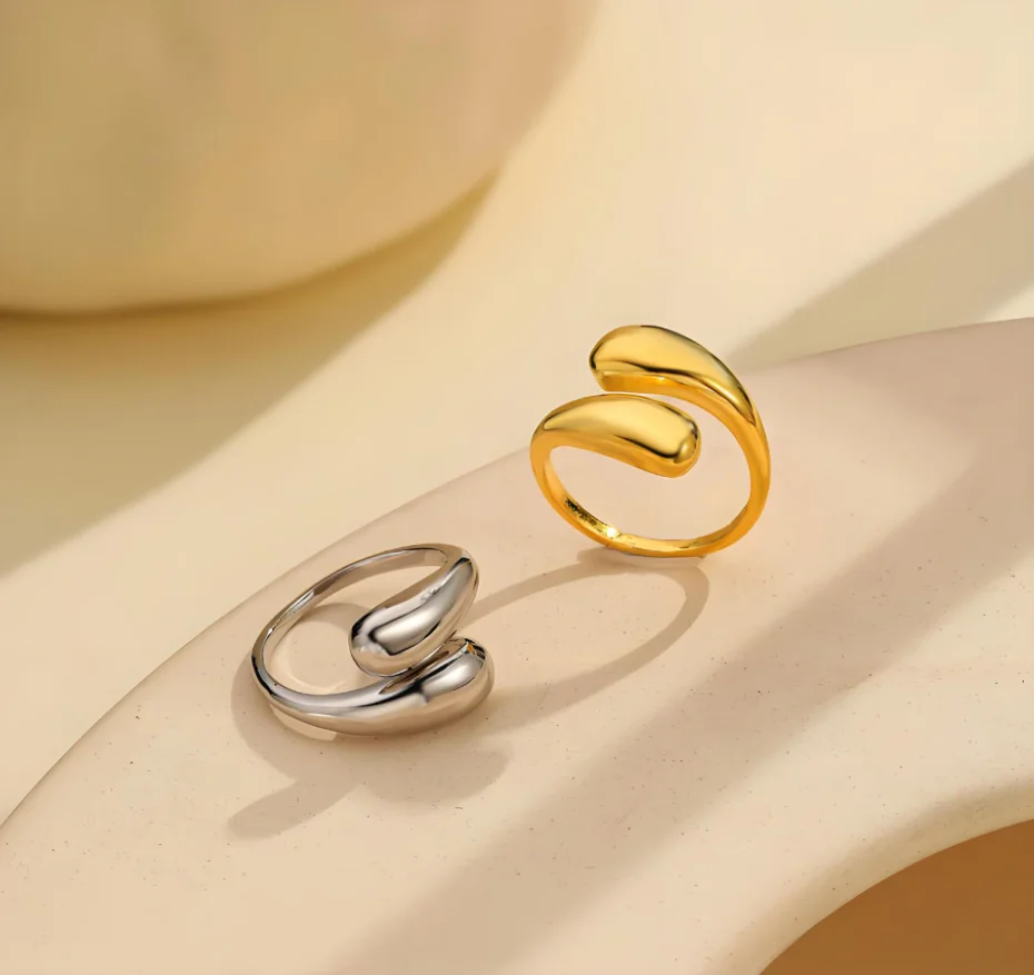 New titanium steel ring for women, fashionable and niche design, irregular opening, versatile ring, smooth water droplet design