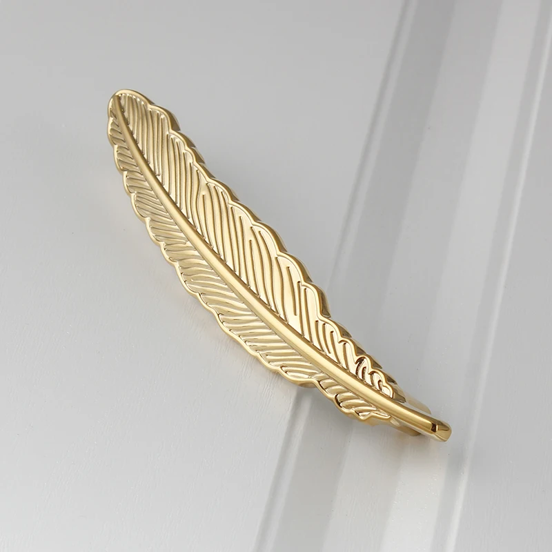 مقابض أبواب نحاسية أحادية الفتحة في الشمال ، وسحّابات الجناح ، وديكور خزانة الملابس الذهبية ، ومقابض أدراج أنيقة ، فريدة وفريدة من نوعها