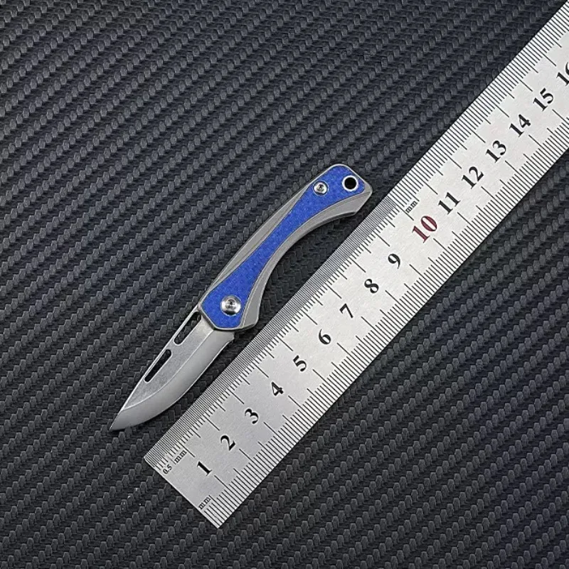 

New portable mini folding knife D2 Blade titanium alloy Handle Pocket Survival Tactical Hunting Utility Fruit Knives EDC Tool