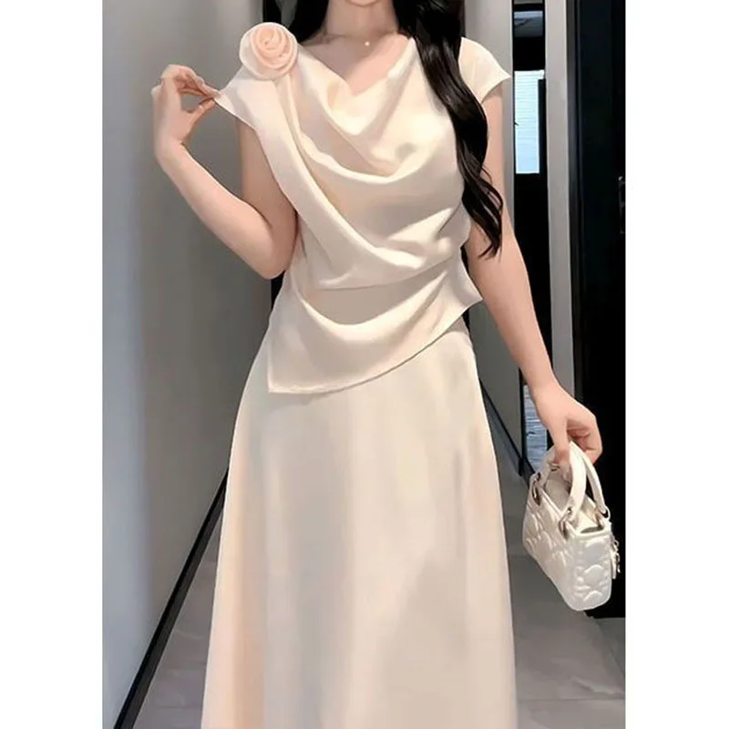 

Skirt suit women's summer 2024 new high-grade sense slim irregular top temperament high waist skirt two-piece suit.