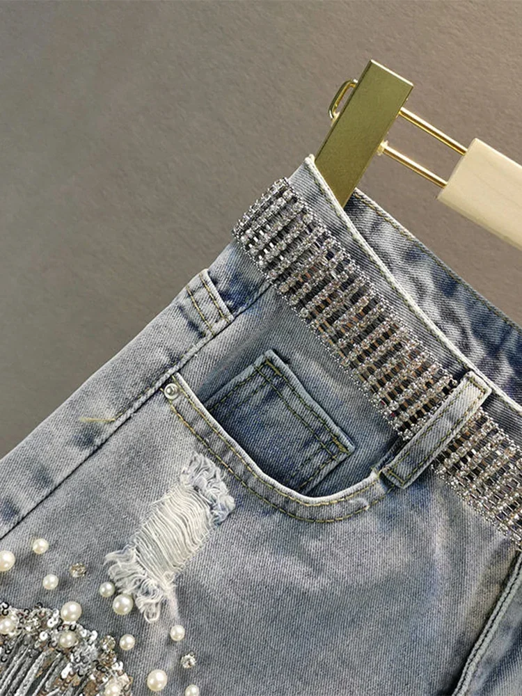 Pantaloncini eleganti per le donne estate nappa che borda pantaloncini di Jeans a gamba larga a vita alta pantaloncini solidi Casual femminili Jeans per donna 2024