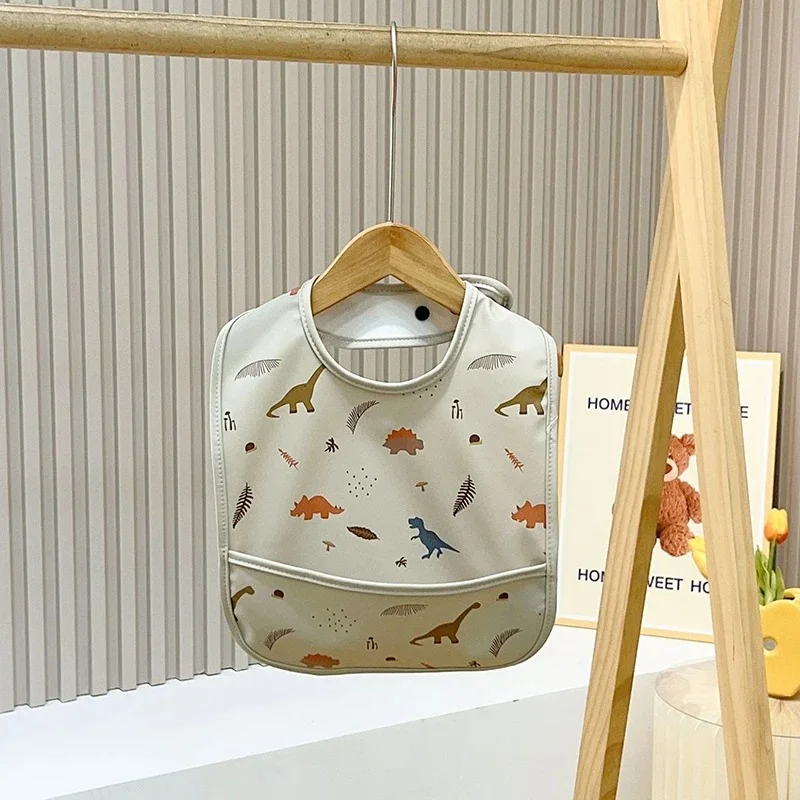 

PU Waterproof Baby Bibs with Pocket Newborns Cartoon Bibs Burp Cloth Baby Scarf Bandana Bibs Feeding Boys Girls Baby Stuff