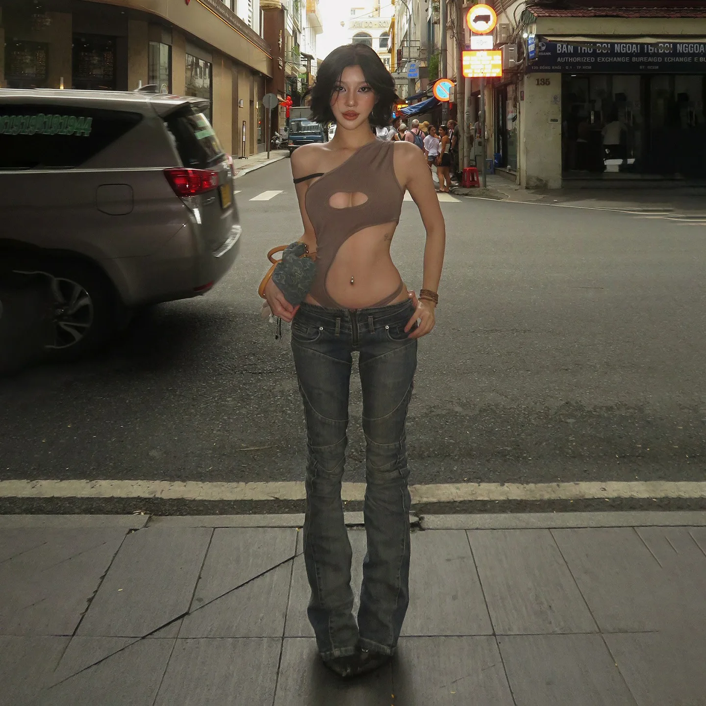Vaqueros largos divididos de estilo retro de calle americana con un diseño sexy de pierna recta informal ajustado de tiro bajo