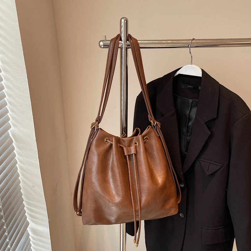 

Vintage Women's Bucket Bags Solid Color Pu Leather String Backpack Large Capacity Female Casual Commuting Crossbody Packs