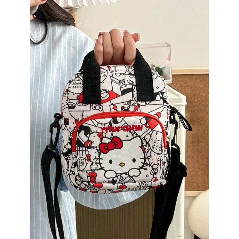 Sanurgente-Sac à bandoulière de dessin animé mignon pour femme, Hello Kitty, tendance de la rue, sac à main décontracté, sac de voyage en toile, nouveau