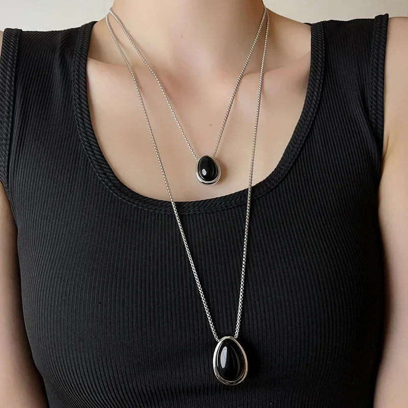 

2024 new high-end oval black agate pendant long light luxury niche two-color water drop necklace