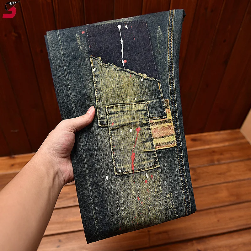 Fashion stitching motorcycle jeans men's Hole & patch printed graffiti slim fit skinny stretch Street handsome retro long pants