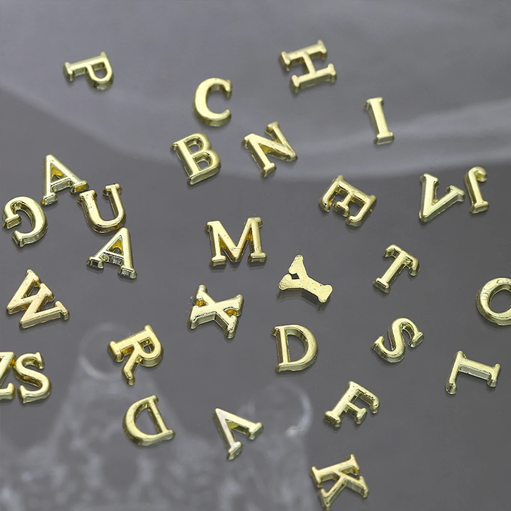 26 قطعة معدنية 26-الأبجدية ثقب حلقة مسمار سحر الذهب/الفضة الإنجليزية إلكتروني سبيكة الراين جوهرة DIY بها بنفسك ثلاثية الأبعاد مسمار الفن الديكور