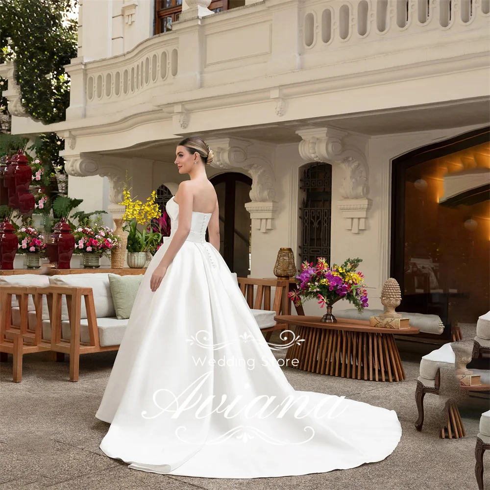 Aviana ที่กําหนดเองแขนกุด A-Line ชุดแต่งงานคราบโบว์ Sweetheart Sweep Train ชุดเจ้าสาวหรูหราคุณภาพสูง 2025