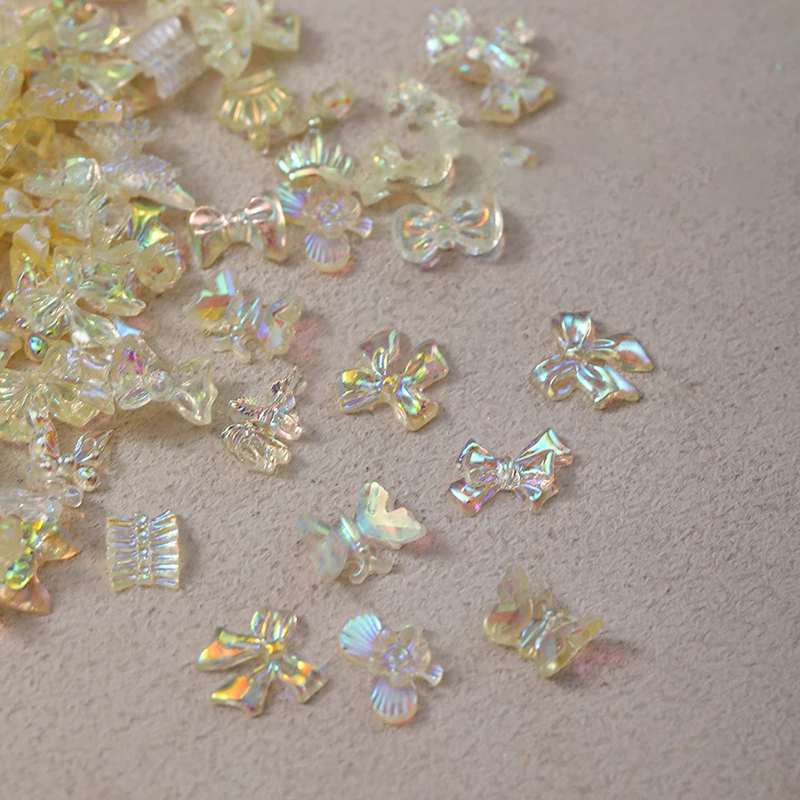 50 pezzi Auroras in resina trasparente con fiocco a forma di cuore per nail art, simpatico orso, farfalla, glitter, decorazione per unghie, accessori per gioielli