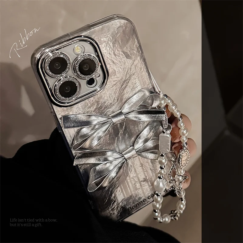 Glacier patterned silver three-dimensional bow phone case with silver star pearl phone strap for iPhone 11 12 13 14 15 16 promax