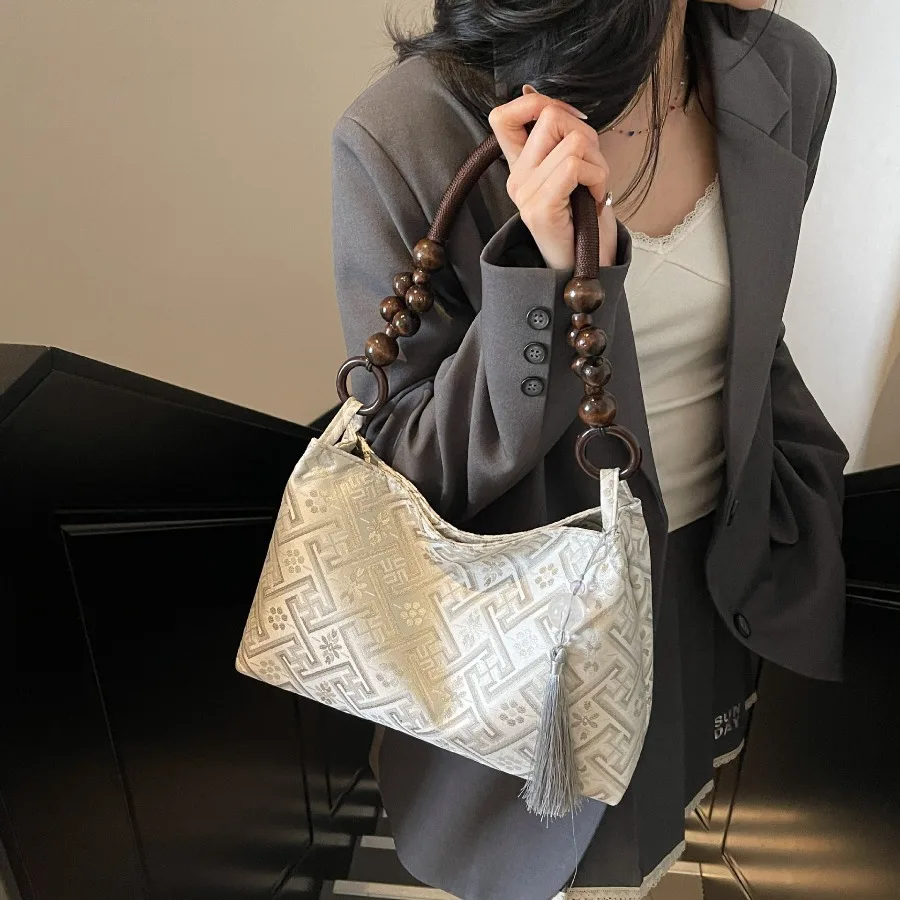 

New Chinese-Style Niche Shoulder Bag for Women: Spring/Summer Ethnic Beaded Crossbody Bag with Embroidered Handle