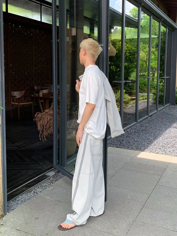 アメリカンレトロパッチワークナイフジーンズ、ゆったりとしたカジュアルなワイドレッグ、フロア丈のパンツ、男女兼用