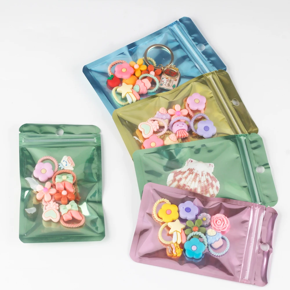 Lot de 100 sacs cadeaux transparents auto-adhésifs verts et colorés pour colliers, barrettes, accessoires, bijoux et bonbons – Populaire