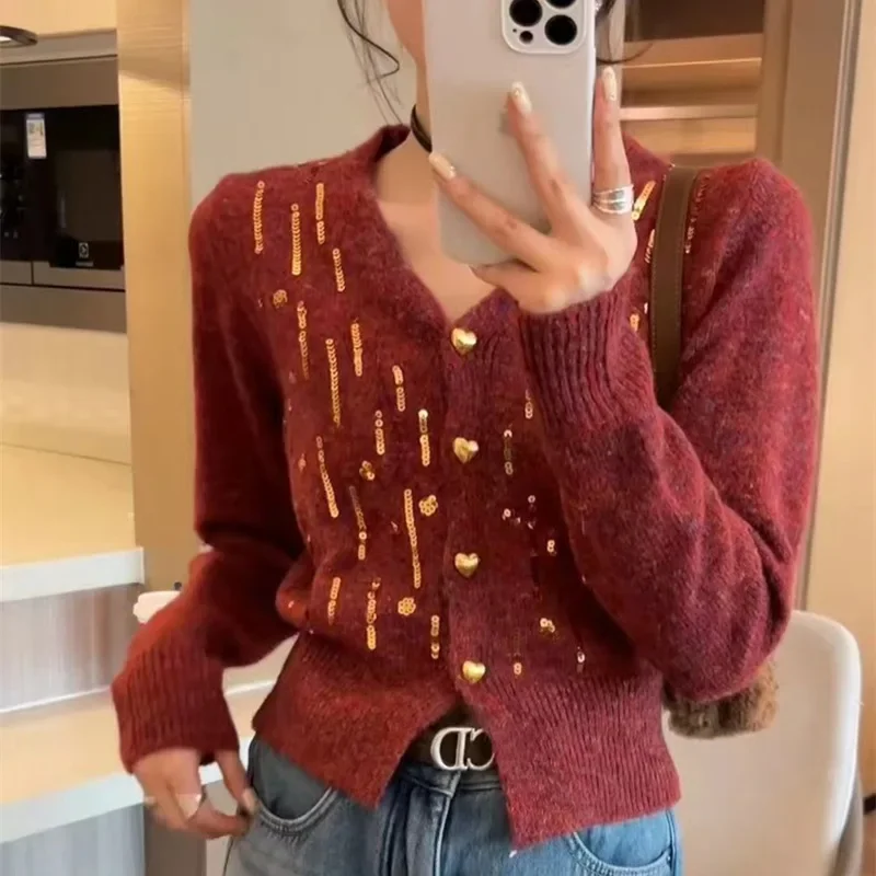 

Red sequined V-neck knit cardigan women's autumn and winter new niche lazy wind soft waxy tie-dye sweater casual coat outside.