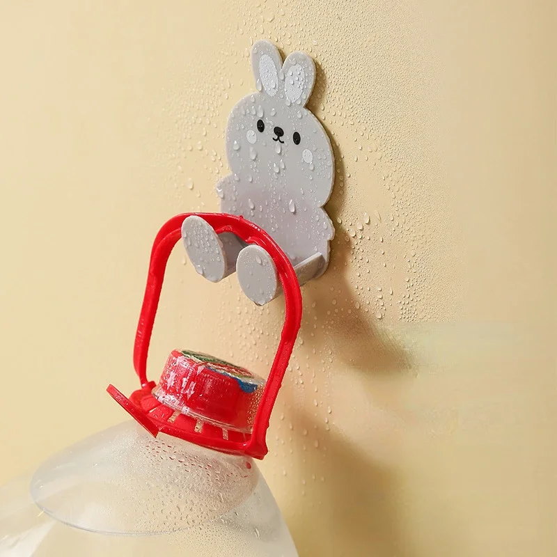 Cute rabbit plug key hook kitchen wall hole free hook living room phone charging rack multifunctional decorative hook