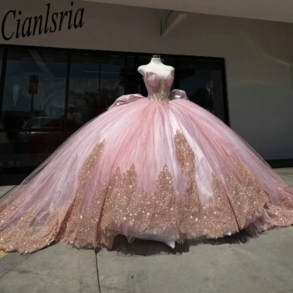 

Pink Sweetheart Sleeveless Bow Quinceanera Dresses Ball Gown Gold Appliques Lace Ruffles Sweet 15 Años Mexican Customized