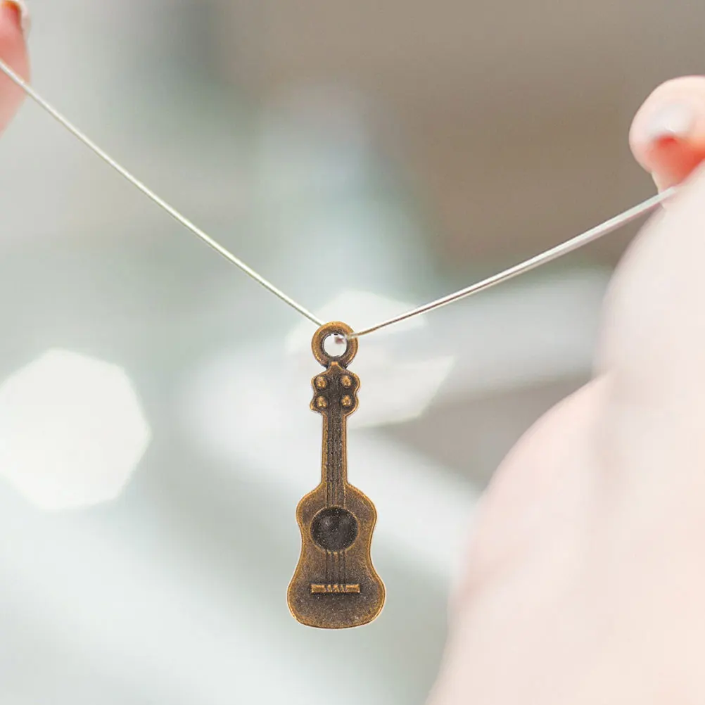 

100 Pcs Pendant Phone Case Charm Retro Mini Guitar naments Diy Accessories PHONE SHELL Phone Shell Charms DECORATIONS