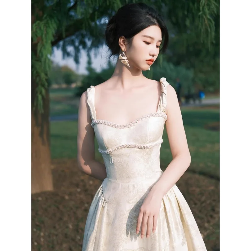 2025 女性スパゲッティストラップ花柄ミディドレスエレガントな背中の開いた Sleevelss 大きな裾 A ラインドレス 2025 女性パーティーイブニングドレス