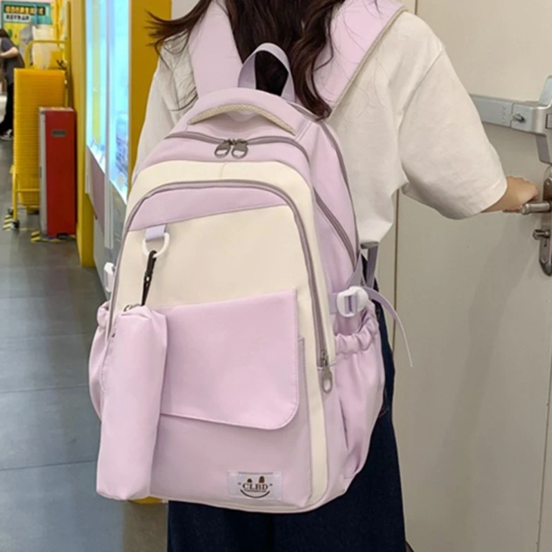 Mochila nailon para uso diario con estuches para lápices, bolso escolar estético