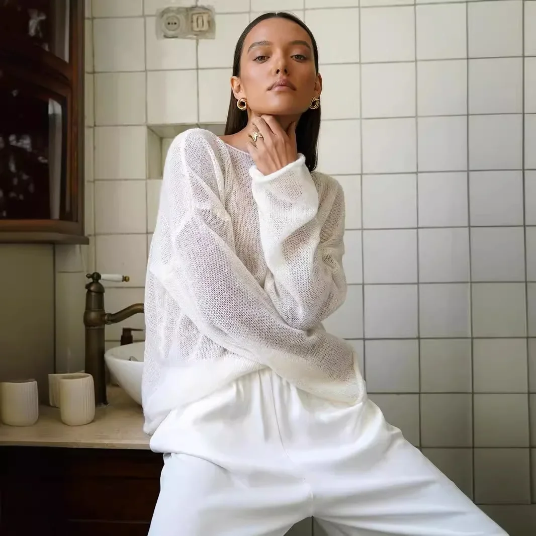 Knitted Shirt Hollow European and American Spring/Summer New Women's Perspective Thin Horn Sleeve Knitted T-shirt 2026 New 2