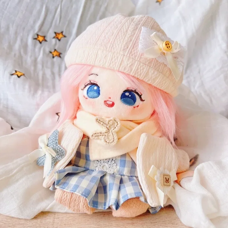 The clothes of the 20 centimeter cotton doll are finely crafted