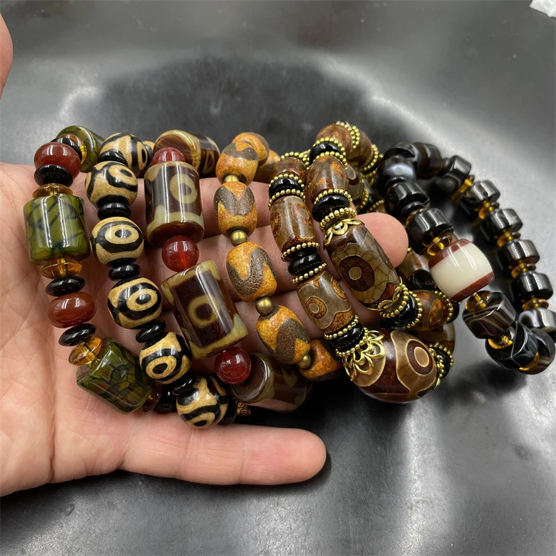 Tibetan-style vintage ivory-colored nine- dzi bracelet with three-eye tube and old agate beads