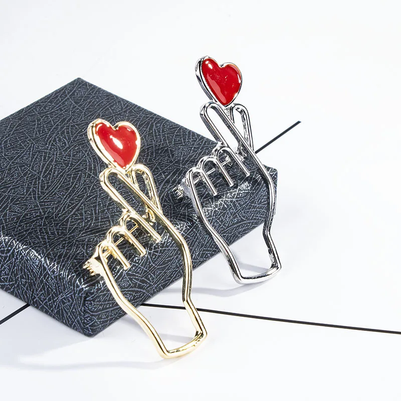 Descubre por qué el broche de corazón rojo es la pieza de moda perfecta para ti