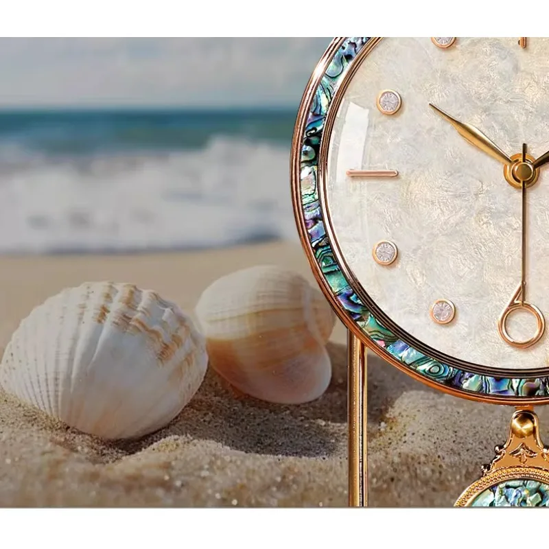 

Retro light luxury seat clock shell new pendulum table clock pendulum clock European decoration American Room decoration
