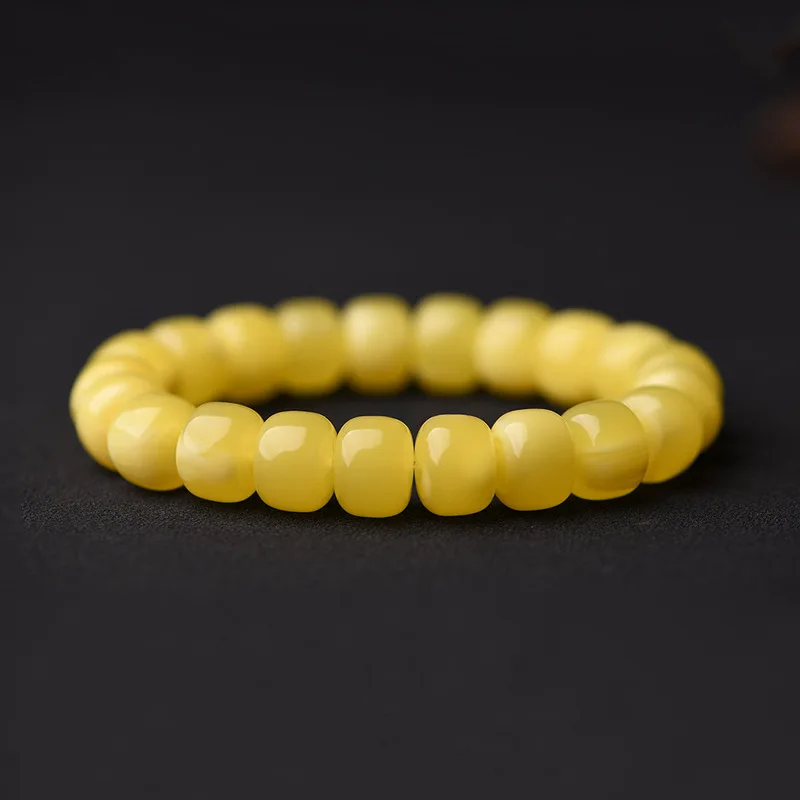 Russian vintage barrel bead bracelet, natural , second-generation golden amber, freeform Buddha beads, collectible ha